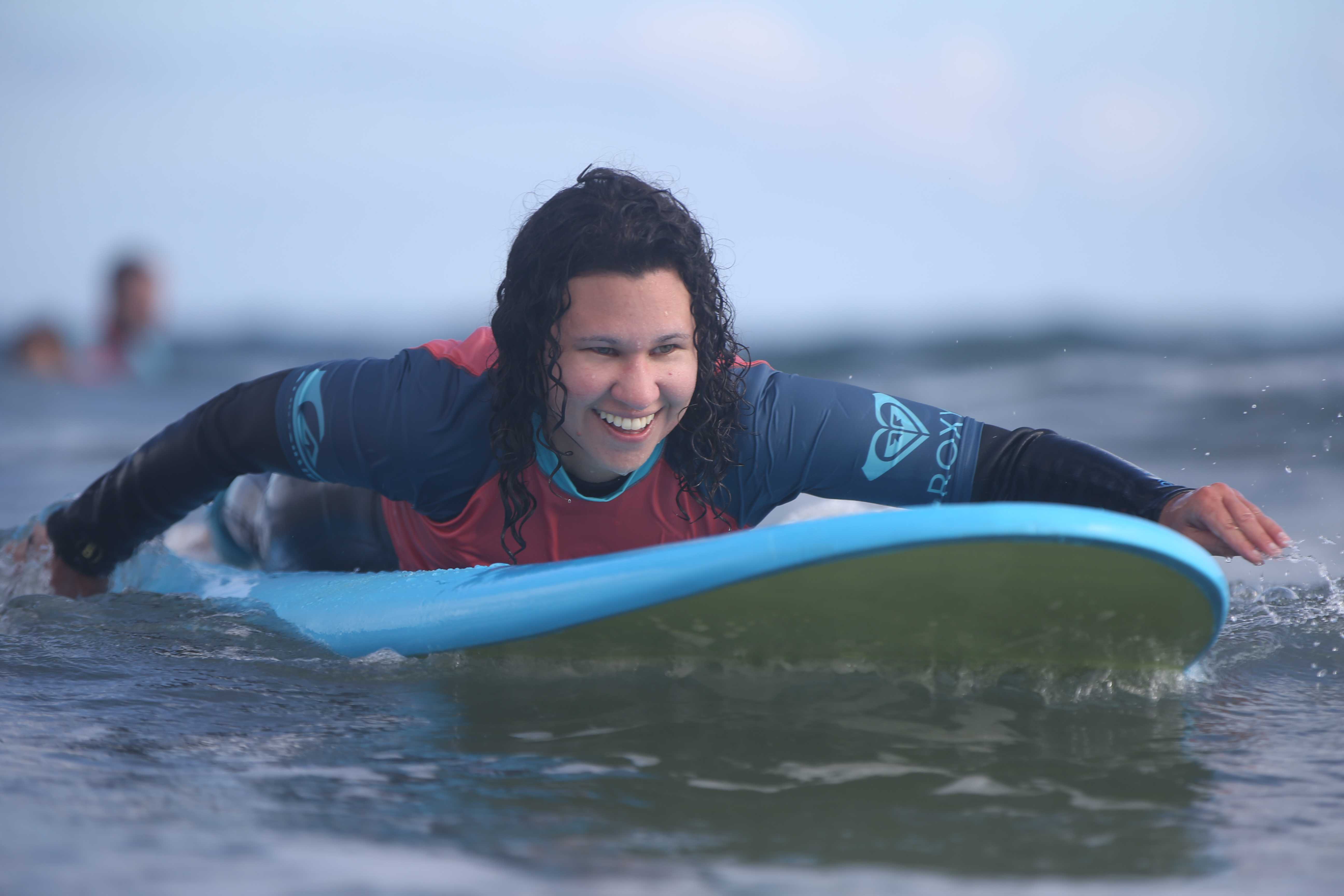 Emma surfing